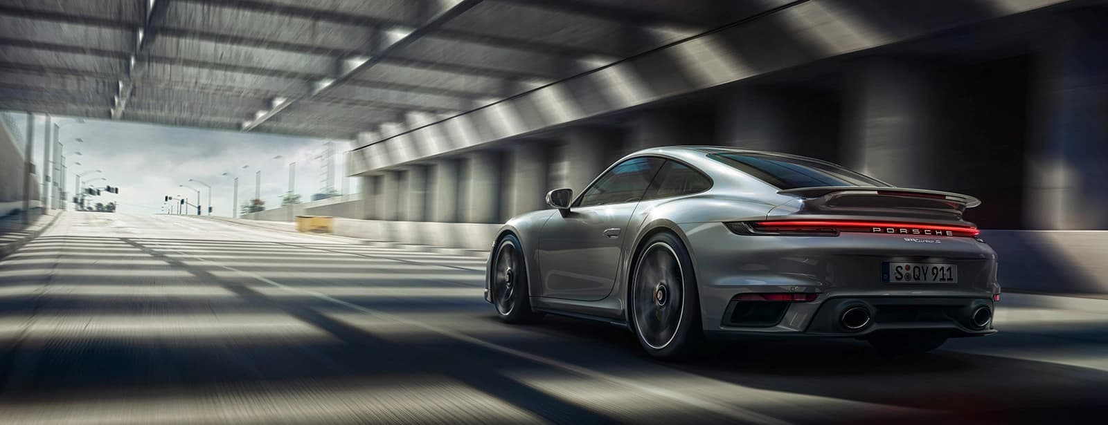 A porsche 911 turbo s speeding